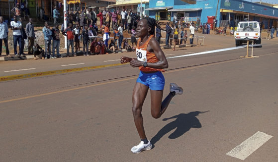 Rebecca Cheptegei, competes at the Discovery 10km road race in Kapchorwa, Uganda, Friday, January 20, 2023. Cheptegei, a Ugandan athlete living in Kenya was set ablaze by her boyfriend on Sunday and is currently receiving treatment for 75 percent burns, police said.