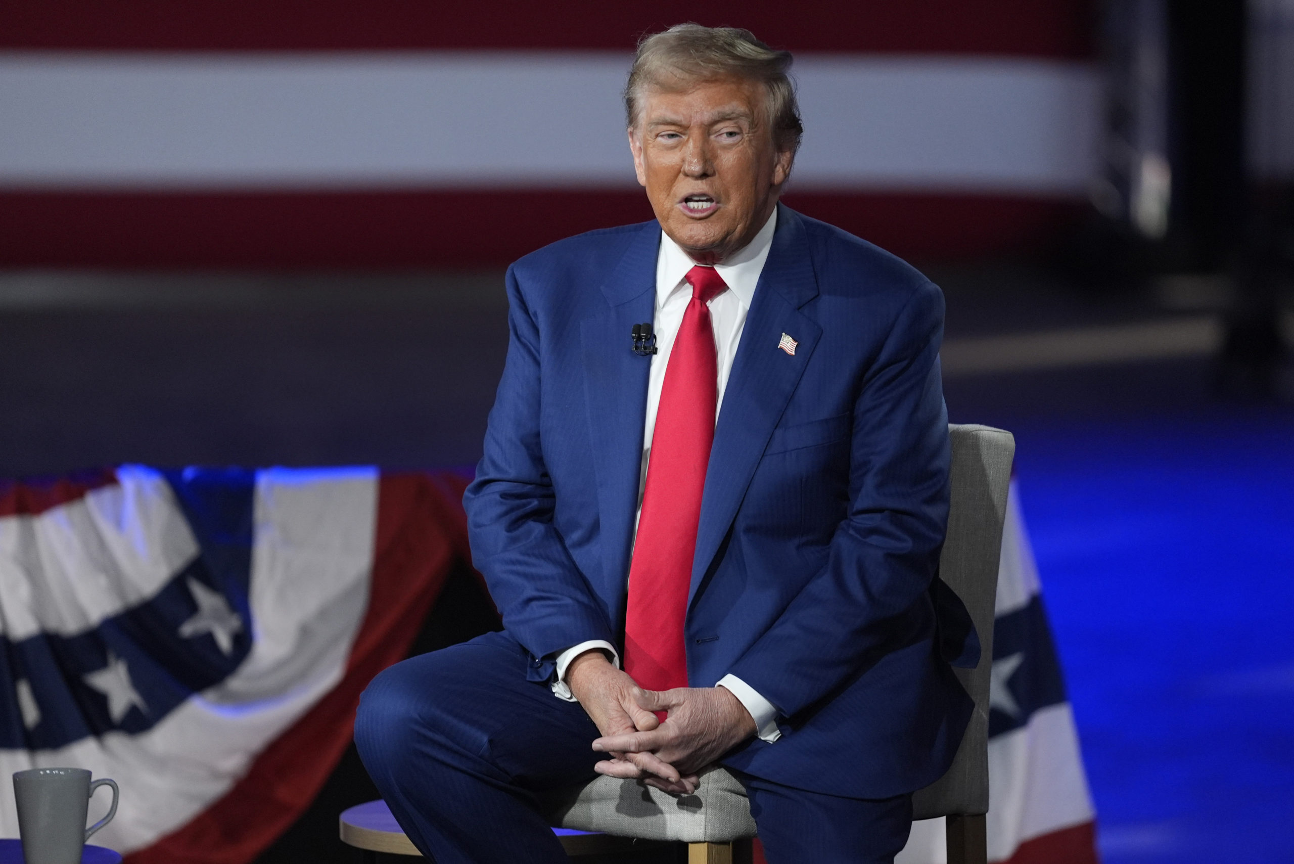 Republican presidential nominee former President Donald Trump participates in a town hall with FOX News host Sean Hannity at the New Holland Arena on Wednesday in Harrisburg, Pennsylvania.