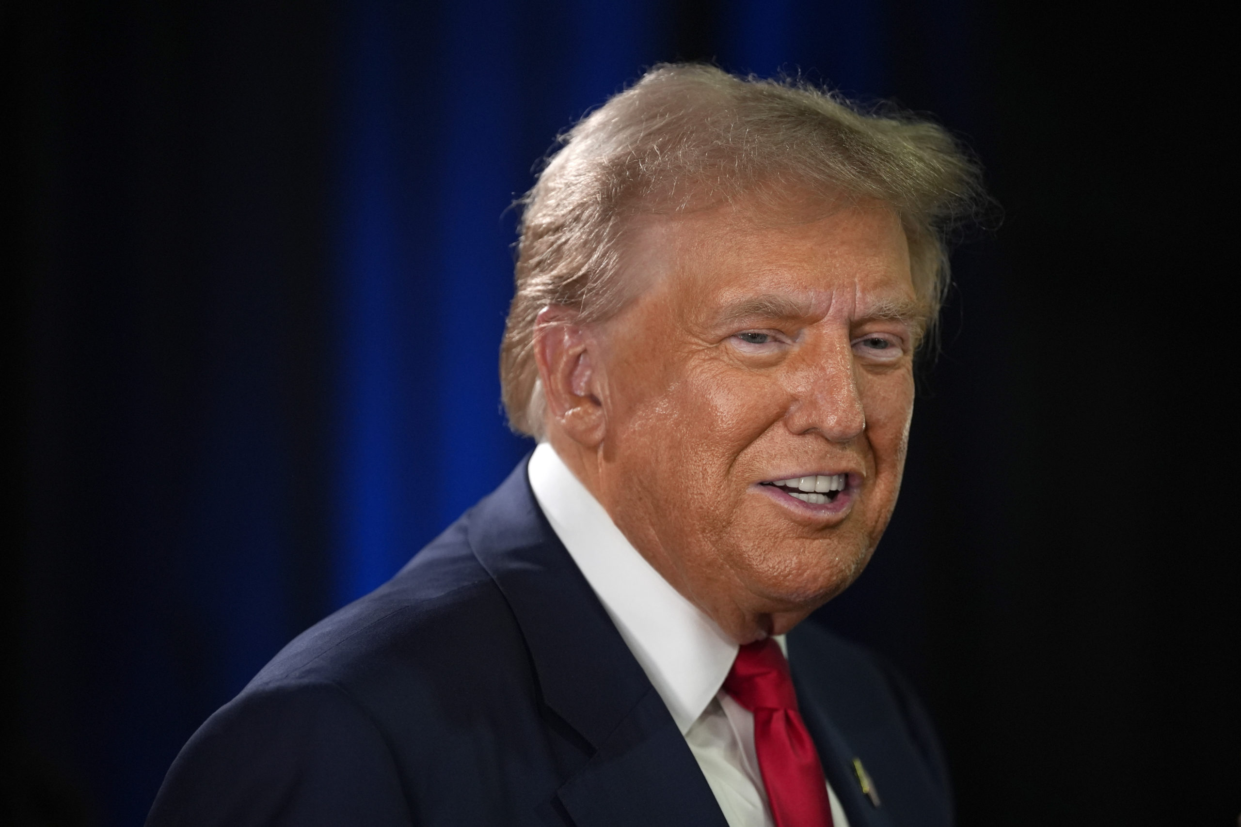 Former President Donald Trump speaks to reporters in the spin room after a presidential debate with Vice President Kamala Harris in Philadelphia, Pennsylvania, on Tuesday.