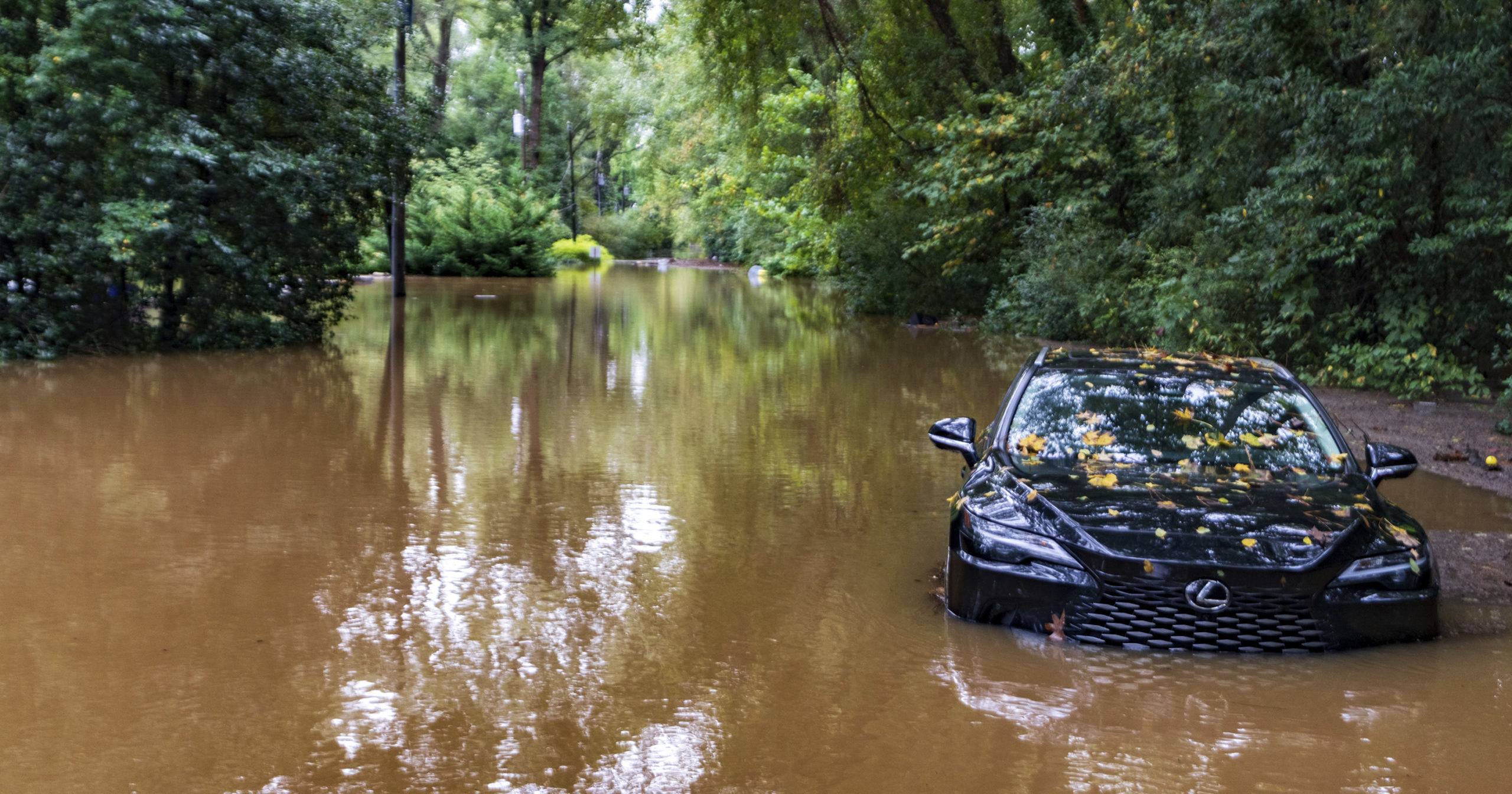 EV Owners Hit by Hurricane Urged to Tow Vehicles Away from Structures, Objects