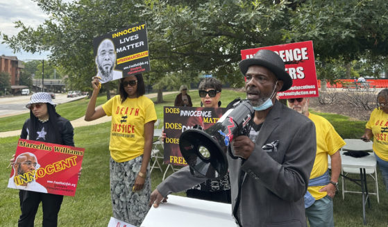 Joseph Amrine, who was exonerated two decades ago after spending years on death row, speaks at a rally to support Missouri death row inmate Marcellus Williams on Aug. 21 in Clayton, Missouri.