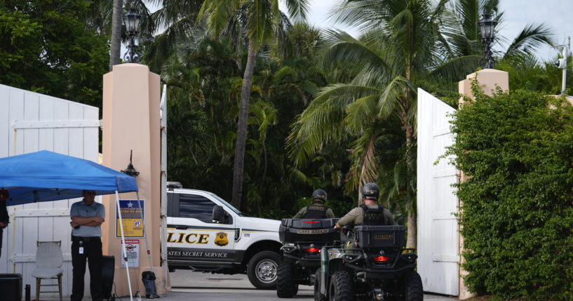 Police drive in to the Mar-a-Lago estate of Republican presidential nominee and former President Donald Trump, one day after an apparent assassination attempt, in Palm Beach, Florida on Monday.