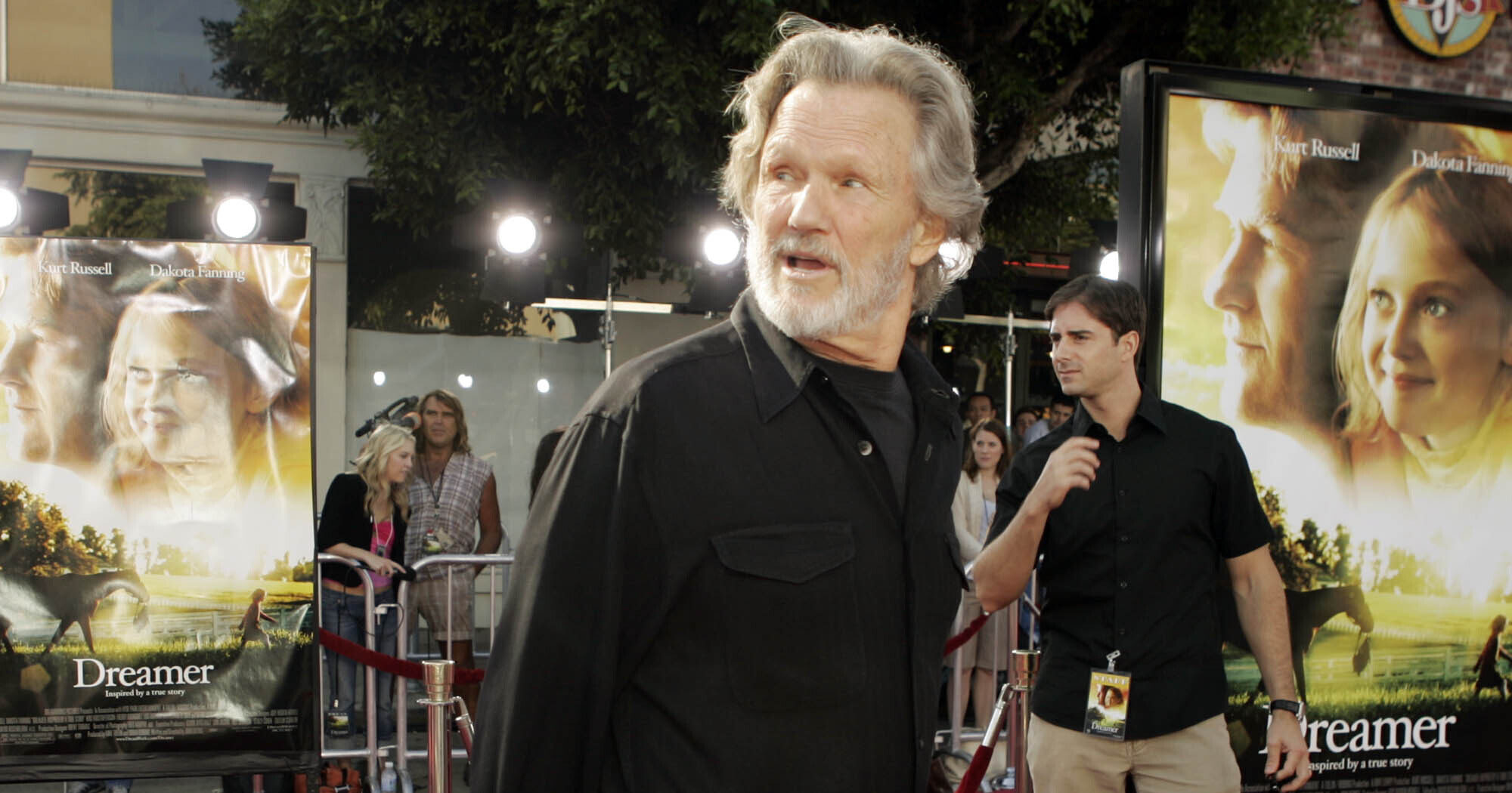 Actor Kris Kristofferson walks down the red carpet during the premiere of his new movie "Dreamer," Oct. 9, 2005, in the Westwood section of Los Angeles.