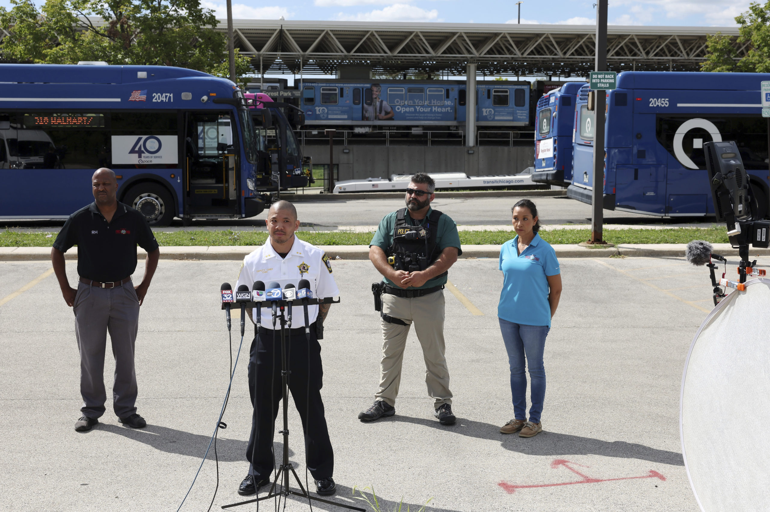 Forest Park Police Deputy Chief Christopher Chin gives a news briefing outside the CTA Forest Park station, after a shooting in Forest Park, Illinois, on Monday.