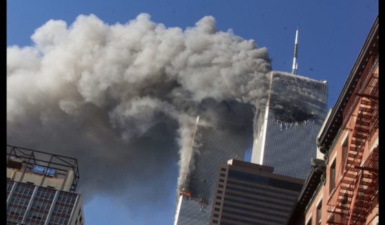 The World Trade Center on fire after hijacked planes crashed into the towers in New York City on Sept. 11, 2001.