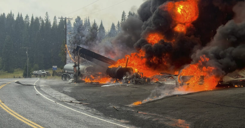 A fire burns at the gas station after an explosion in Cardiff, Idaho, on Wednesday.