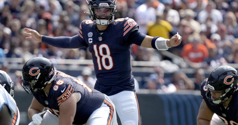 Chicago Bears quarterback Caleb Williams calls a play at the line of scrimmage during the first half of an NFL football game against the Tennessee Titans In Chicago, Illinois, on Sunday.