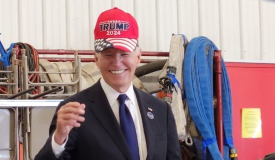 Biden appears to have accidentally put on a "Trump 2024" hat on Wednesday.