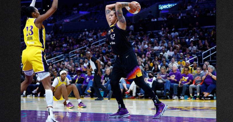 Brittney Griner #42 of the Phoenix Mercury controls the ball against the Los Angeles Sparks in the first half at Crypto.com Arena Tuesday in Los Angeles, California.