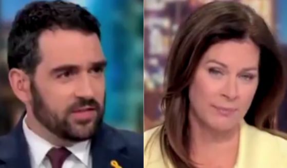 During a segment on CNN on Monday, host Erin Burnett, right, was shocked when Andrew Kaczynski, left, laid out radical answers Kamala Harris had given in a 2019 survey.