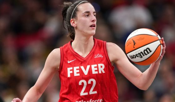 Indiana Fever rookie Caitlin Clark dribbles the ball in the second quarter against the Las Vegas Aces in Indianapolis, Indiana, on Wednesday.