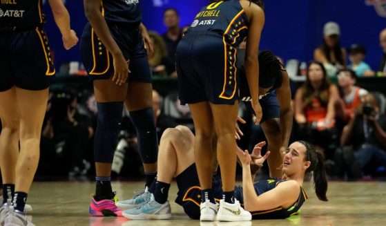 Caitlin Clark of the Indiana Fever reacts during the first half of a first-round WNBA playoff game against the Connecticut Sun in Uncasville, Connecticut, on Sunday.