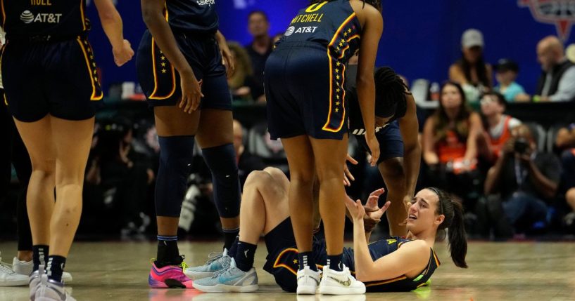 Caitlin Clark of the Indiana Fever reacts during the first half of a first-round WNBA playoff game against the Connecticut Sun in Uncasville, Connecticut, on Sunday.