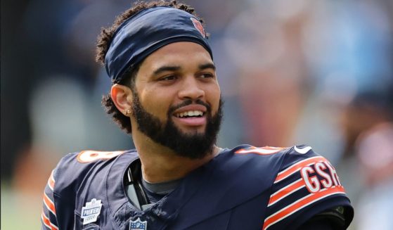 Caleb Williams #18 of the Chicago Bears participates in warm-ups prior to a game against the Tennessee Titans Sunday in Chicago, Illinois. The Bears defeated the Titans 24-17.