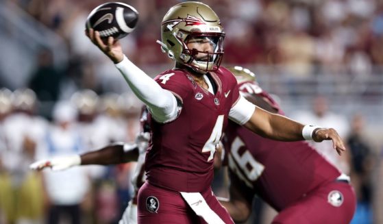 Florida State Seminoles quarterback DJ Uiagalelei passes the ball during the game against the Boston College Eagles in Tallahassee, Florida, on Monday.