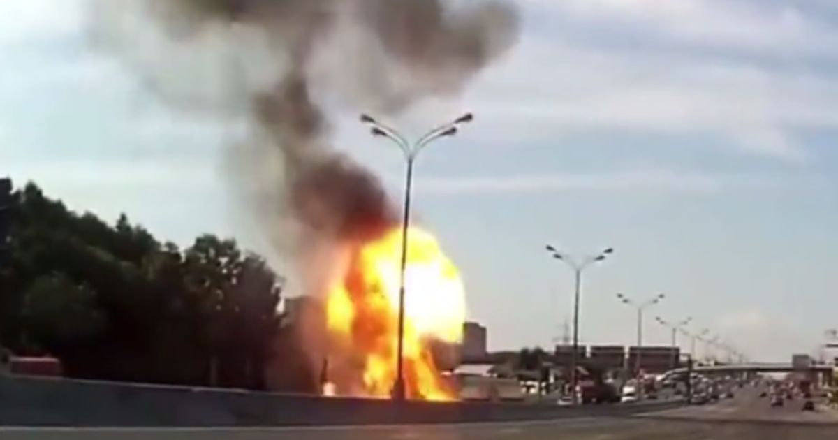 This image shows the explosion of a Tesla vehicle on a highway in 2022.