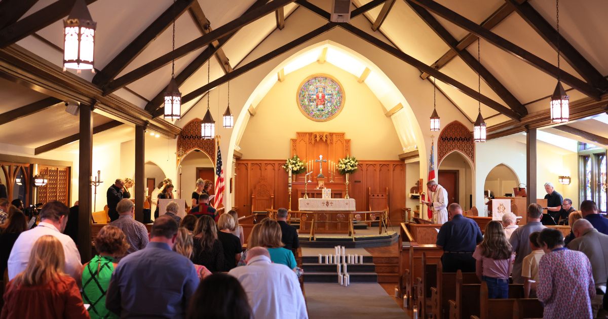 People attend a Mass at St. Phillip's Episcopal Church on May 26, 2022, in remembrance of the victims of a school shooting in Uvalde, Texas.