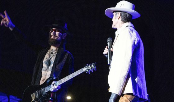 Guitarist Dave Navarro, left, and singer Perry Farrell, right, of Jane's Addiction perform at Red Hat Amphitheater in Raleigh, North Carolina, on Sept. 3.