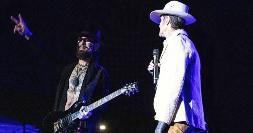 Guitarist Dave Navarro, left, and singer Perry Farrell, right, of Jane's Addiction perform at Red Hat Amphitheater in Raleigh, North Carolina, on Sept. 3.