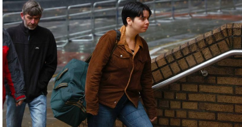 Just Stop Oil activist Anna Holland arrives at London's Southwark Crown Court Friday. Holland and another protester, Phoebe Plummer, were found guilty of criminal damage in a protest action after they splattered Vincent Van Gogh's iconic 'Sunflowers' painting with tomato soup, at the National Gallery in London in October 2022.