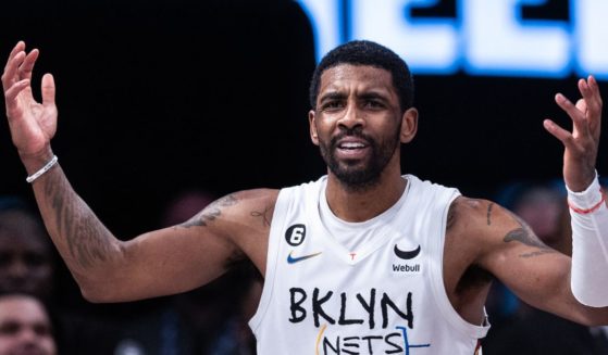 Kyrie Irving #11 of the Brooklyn Nets reacts to a call during the fourth quarter of the the game against the New York Knicks at Barclays Center on January 28, 2023, in New York City.