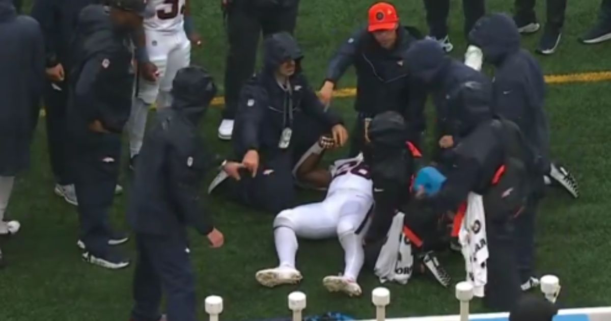 NFL Running Back Collapses on Sideline, Carted Away on a Stretcher