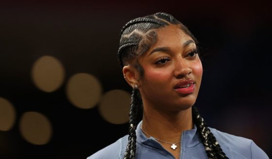 Angel Reese #5 of the Chicago Sky reacts during player intros prior to facing the Atlanta Dream at Gateway Center Arena on September 17, 2024 in College Park, Georgia.