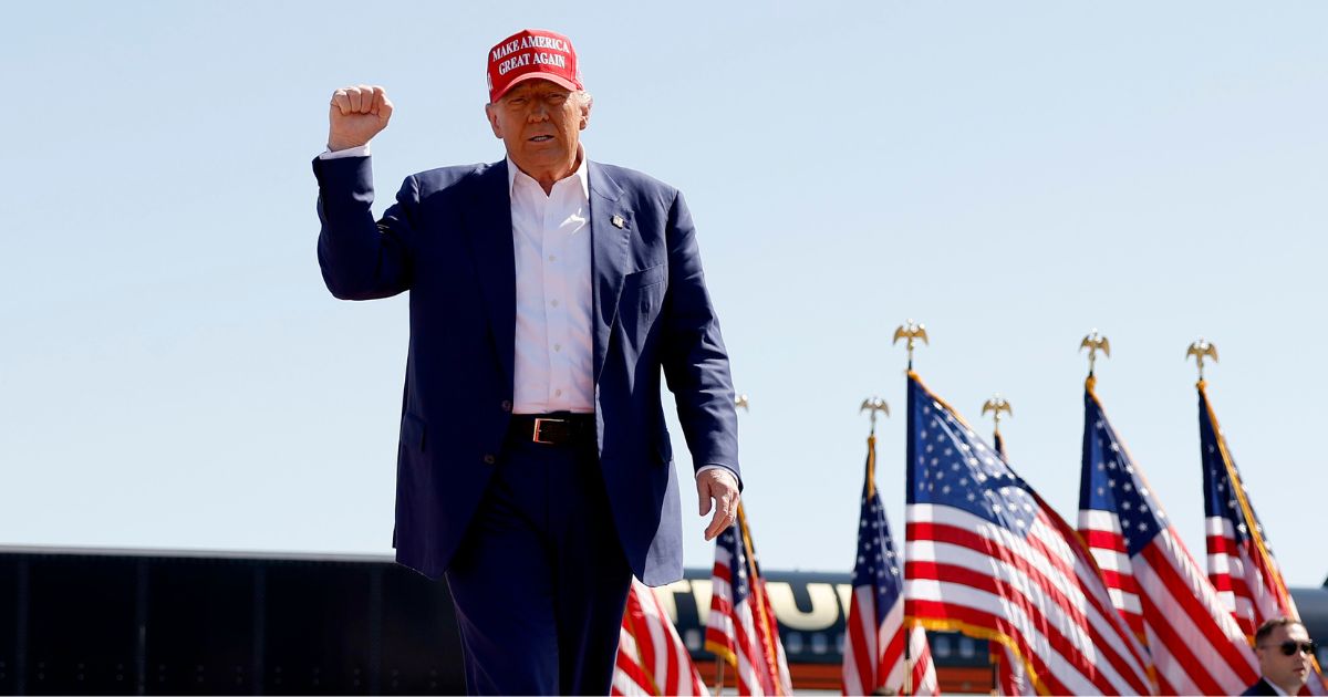 Republican presidential candidate former US President Donald Trump arrives for a campaign rally at the Aero Center Wilmington on September 21, 2024 in Wilmington, North Carolina.