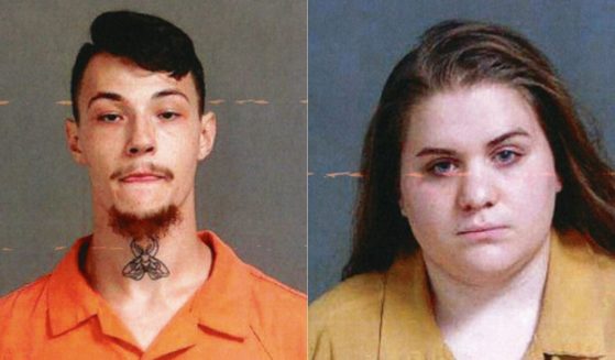 A bride and groom arrested on second-degree murder charges after the death of a groomsman.