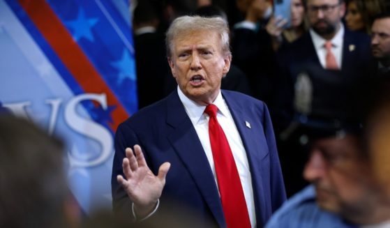 Republican presidential nominee, former President Donald Trump talks to journalists in the spin room after he debated Democratic presidential nominee, U.S. Vice President Kamala Harris at The National Constitution Center on September 10, 2024 in Philadelphia, Pennsylvania.