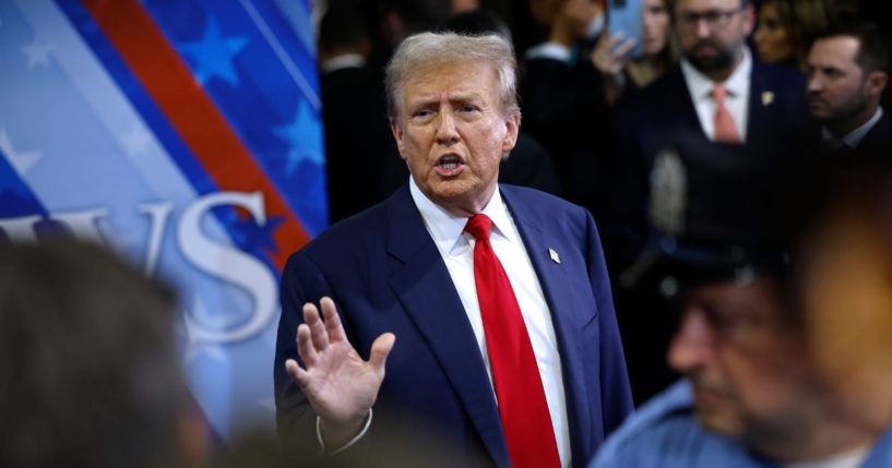 Republican presidential nominee, former President Donald Trump talks to journalists in the spin room after he debated Democratic presidential nominee, U.S. Vice President Kamala Harris at The National Constitution Center on September 10, 2024 in Philadelphia, Pennsylvania.