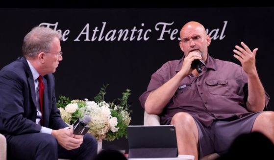 Jeffrey Goldberg and John Fetterman speak on stage during the "In Conversation with John Fetterman" panel for The Atlantic Festival 2024 on September 19, 2024 in Washington, DC.