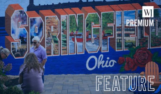 A mural is displayed in an alley downtown in Springfield, Ohio. Springfield, home to a large Haitian community, was thrust into the national spotlight after former President Donald Trump made claims during the presidential debate against Vice President Kamala Harris, accusing members of the immigrant community of eating the pets of local residents.