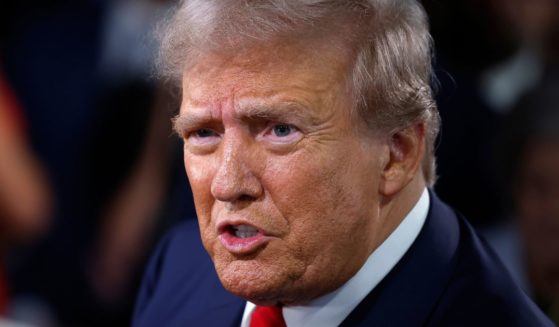 Former President Donald Trump speaks with Sean Hannity in the spin room following the presidential debate against Vice President Kamala Harris in Philadelphia, Pennsylvania, on Tuesday.