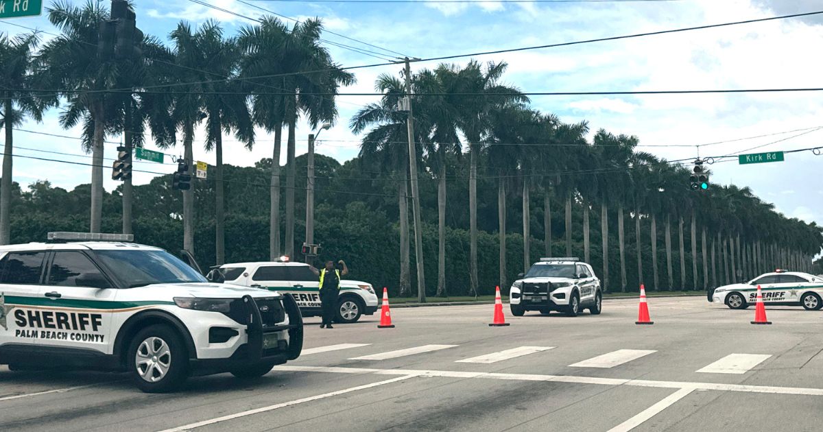 Sheriff vehicles are pictured near Trump International Golf Club in West Palm beach, Florida, after reported in the vicinity of former President Donald Trump.