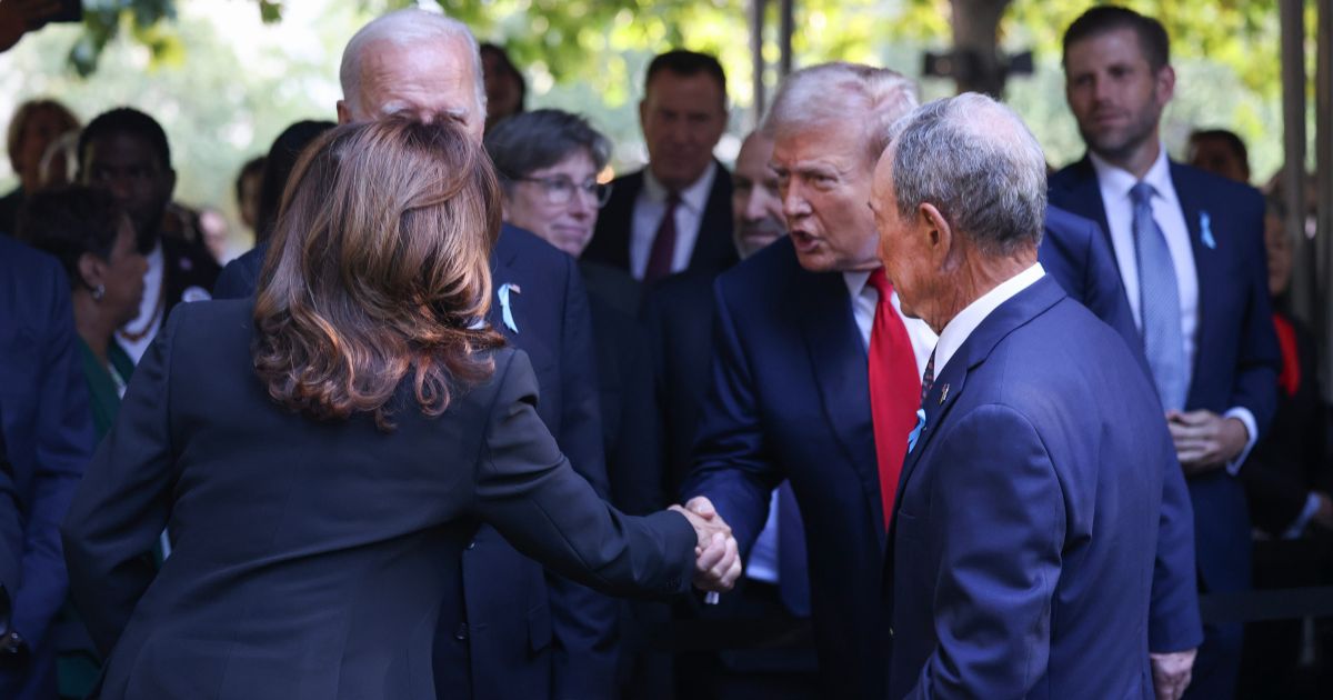 Vice President Kamala Harris, left, shakes the hand of former President Donald Trump, second from right, at a memorial service for the Sept. 11, 2001, terror attacks in New York City on Wednesday.