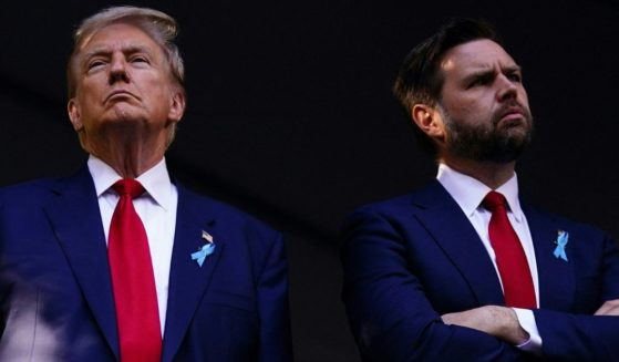 Former President Donald Trump, left, and Sen. J.D. Vance, right, his running mate, attend a remembrance ceremony on the 23rd anniversary of the September 11 terror attack on the World Trade Center at Ground Zero in New York City on Sept. 11.