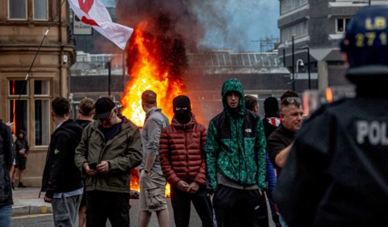 Far-right activists hold an 'Enough is Enough' protest on August 02, 2024 in Sunderland, England. After the murders of three girls in Southport earlier this week, misinformation spread via social media and fueled acts of violent rioting from far-right actors across England. While they prefer to be called 'concerned parents', their actions point to racial hatred with a particular focus on Islamophobia thus targeting mosques.