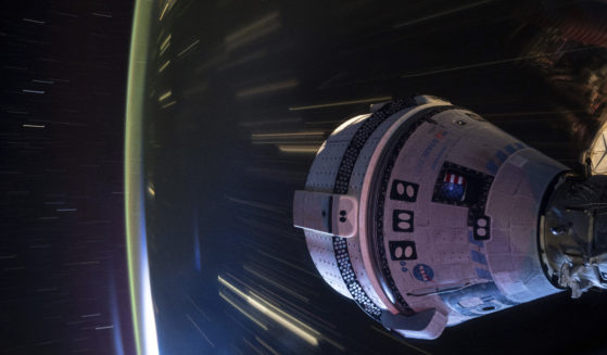 In this long-exposure photo provided by NASA, Boeing's Starliner spacecraft is docked to the Harmony module of the International Space Station on July 3, 2024.