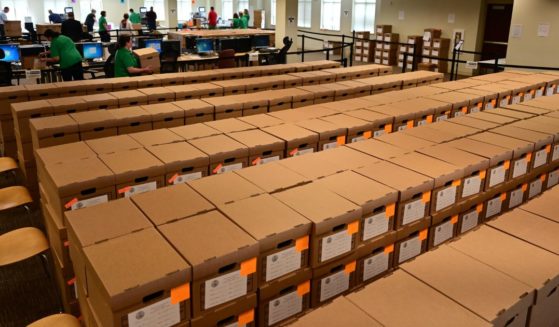 Boxes of ballots are stacked as county officials perform a ballot recount on June 2, 2022 in West Chester, Pennsylvania.