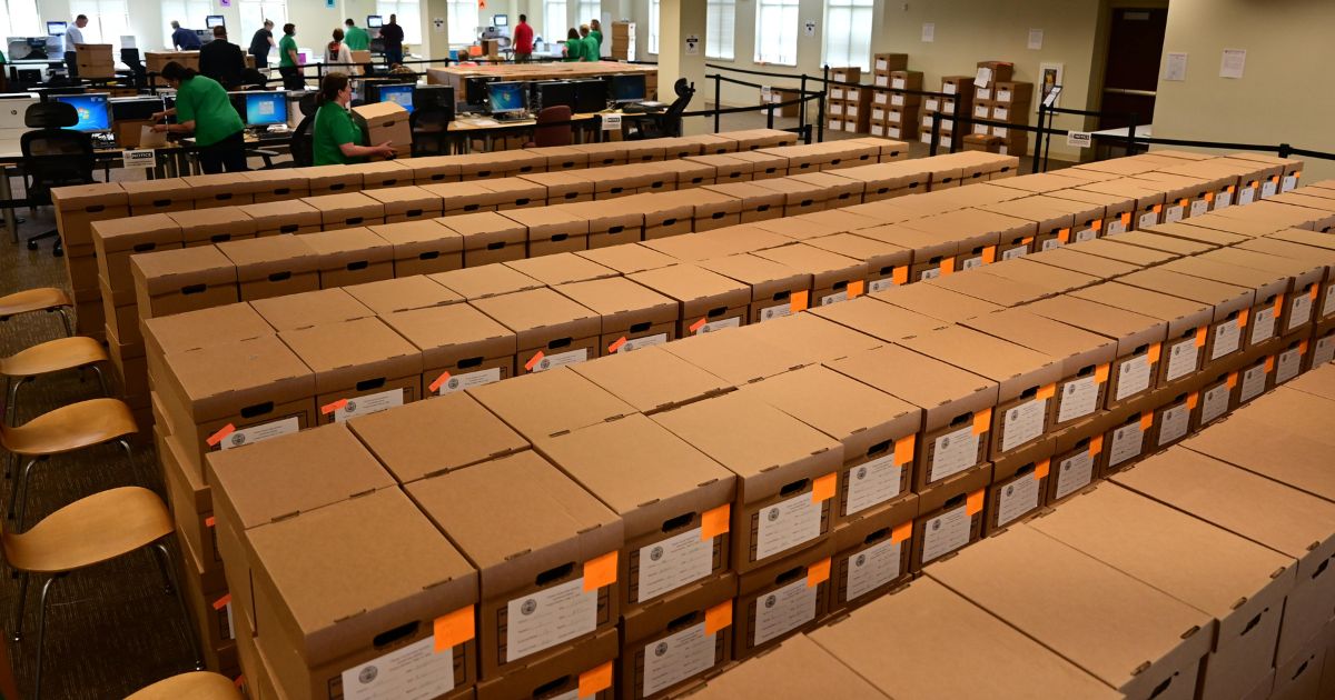 Boxes of ballots are stacked as county officials perform a ballot recount on June 2, 2022 in West Chester, Pennsylvania.