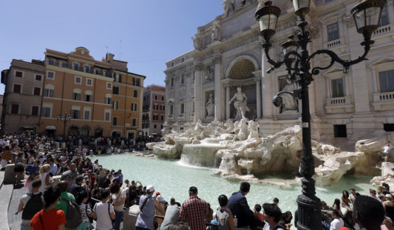 Tourists admire the Trevi Fountain in Rome, June 7, 2017.