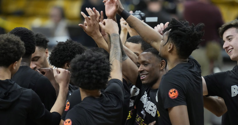 St. Bonaventure players huddle in the first half of a National Invitational Tournament basketball game on Tuesday, March 15, 2022, in Boulder, Colorado.