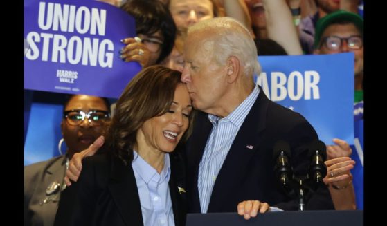 Democratic presidential nominee, U.S. Vice President Kamala Harris is embraced by U.S. President Joe Biden during a campaign event at IBEW Local Union #5 on September 2, 2024 in Pittsburgh, Pennsylvania.