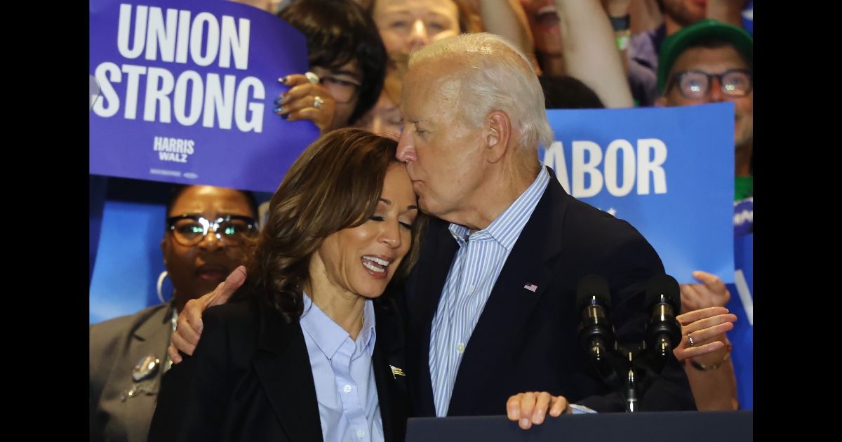 Democratic presidential nominee, U.S. Vice President Kamala Harris is embraced by U.S. President Joe Biden during a campaign event at IBEW Local Union #5 on September 2, 2024 in Pittsburgh, Pennsylvania.