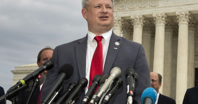 South Dakota Attorney General Jason Ravnsborg speaks to reporters in front of the U.S. Supreme Court in Washington on Sept. 9, 2019.