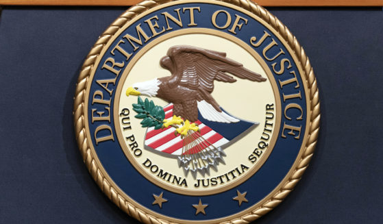 The Department of Justice seals is seen during a news conference at the DOJ office in Washington, D.C., on May 16, 2023.