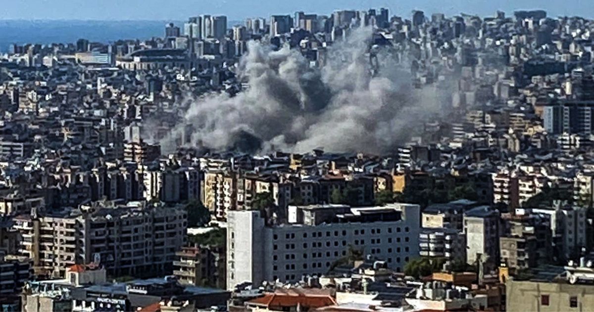 Thick smoke rises above the southern suburbs of Beirut after an Israel strike on September 20, 2024.