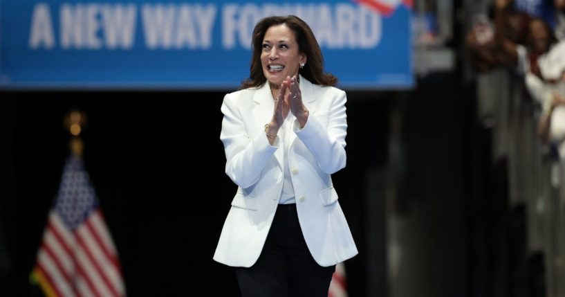 Democratic presidential nominee and Vice President Kamala Harris greets the crowd as she arrives on stage at a campaign rally at the Enmarket Arena in Savannah, Georgia, on Aug. 29.