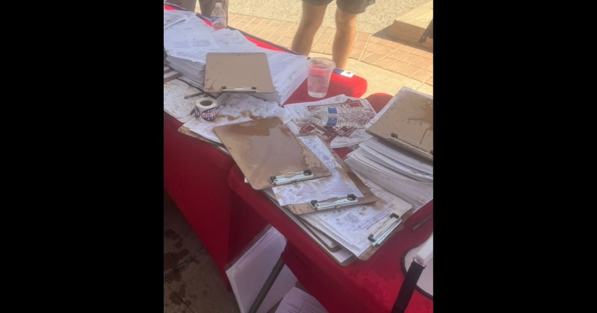 This X screen shot shows the aftermath after students allegedly attacked a table trying to register Republican voters at Arizona State University.